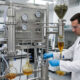 worker performing CO2 cannabis extraction